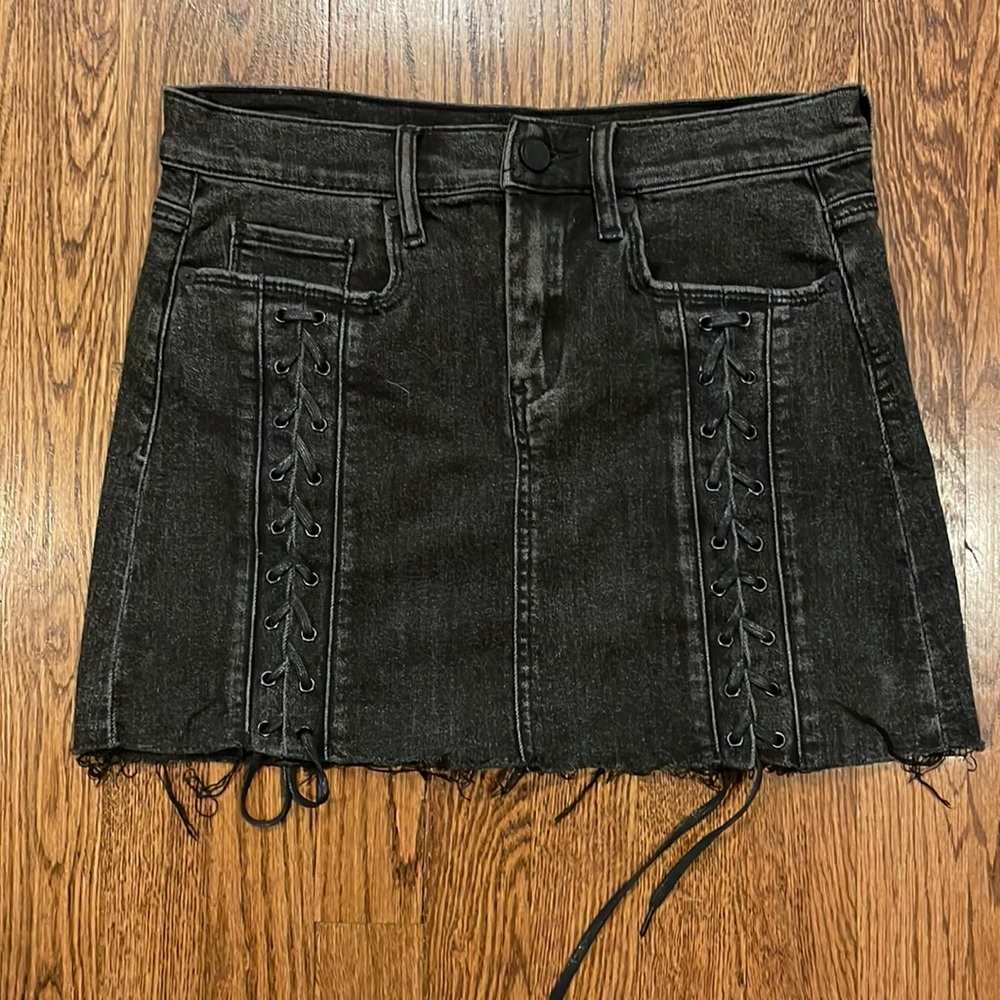 Blank NYC black denim miniskirt with lace up front raw hem size medium (26)